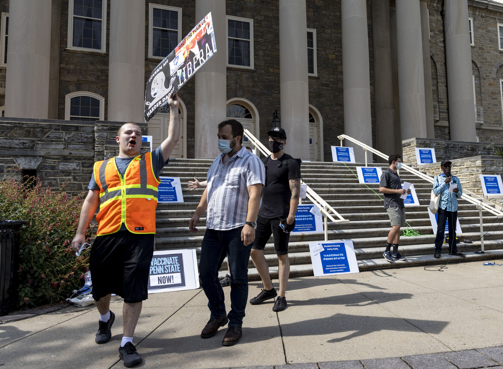 Rally to Vaccinate Penn State, counter protester